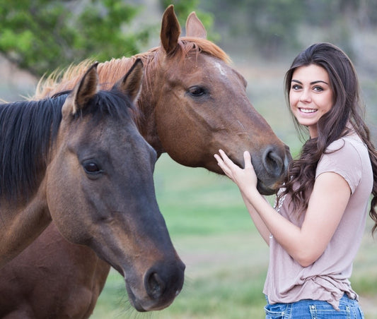 A woman with her horses